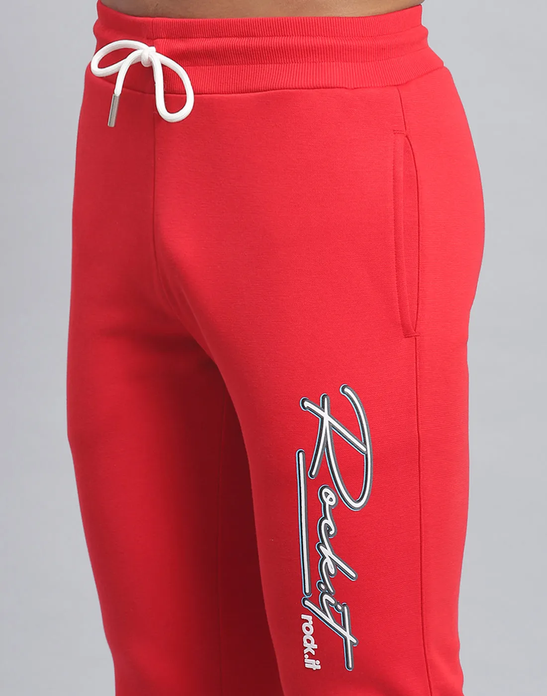 Men Red Solid Hooded Full Sleeve Tracksuit
