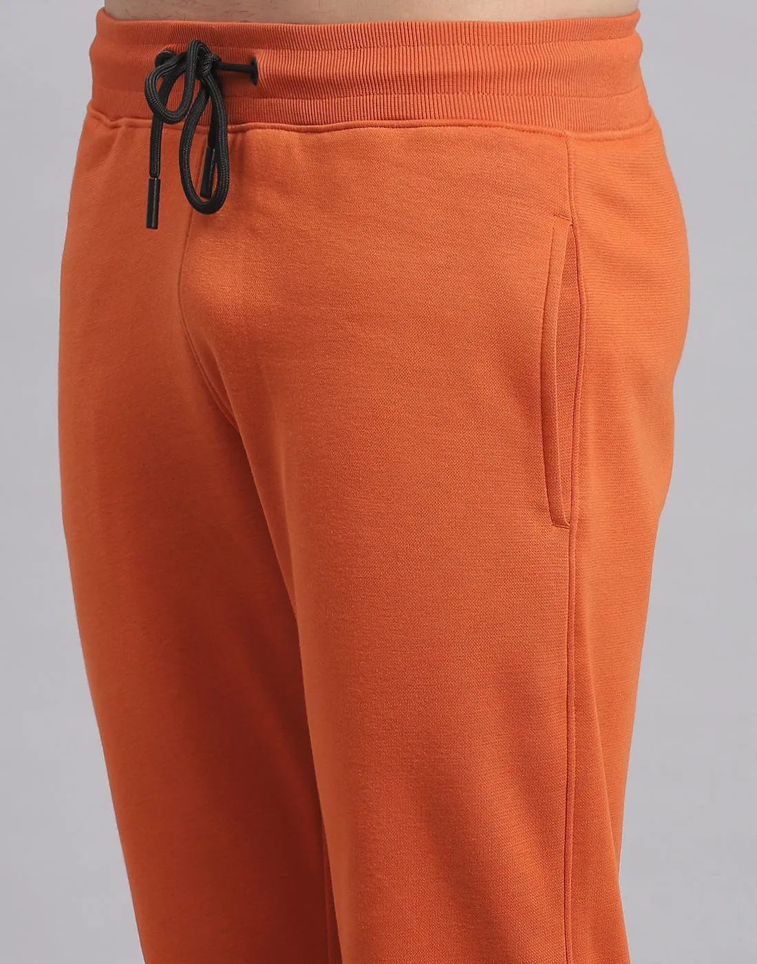 Men Rust Solid Hooded Full Sleeve Tracksuit