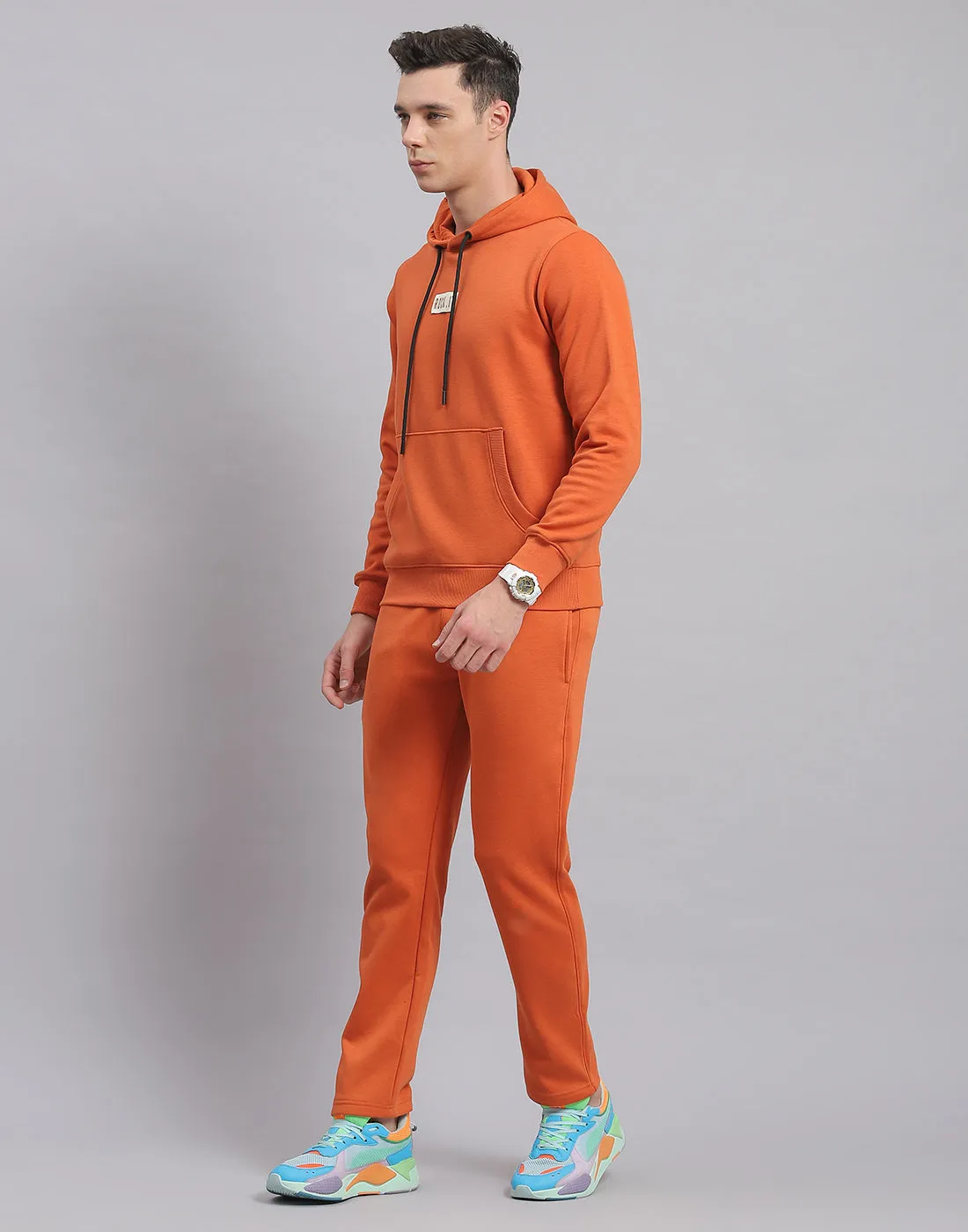 Men Rust Solid Hooded Full Sleeve Tracksuit