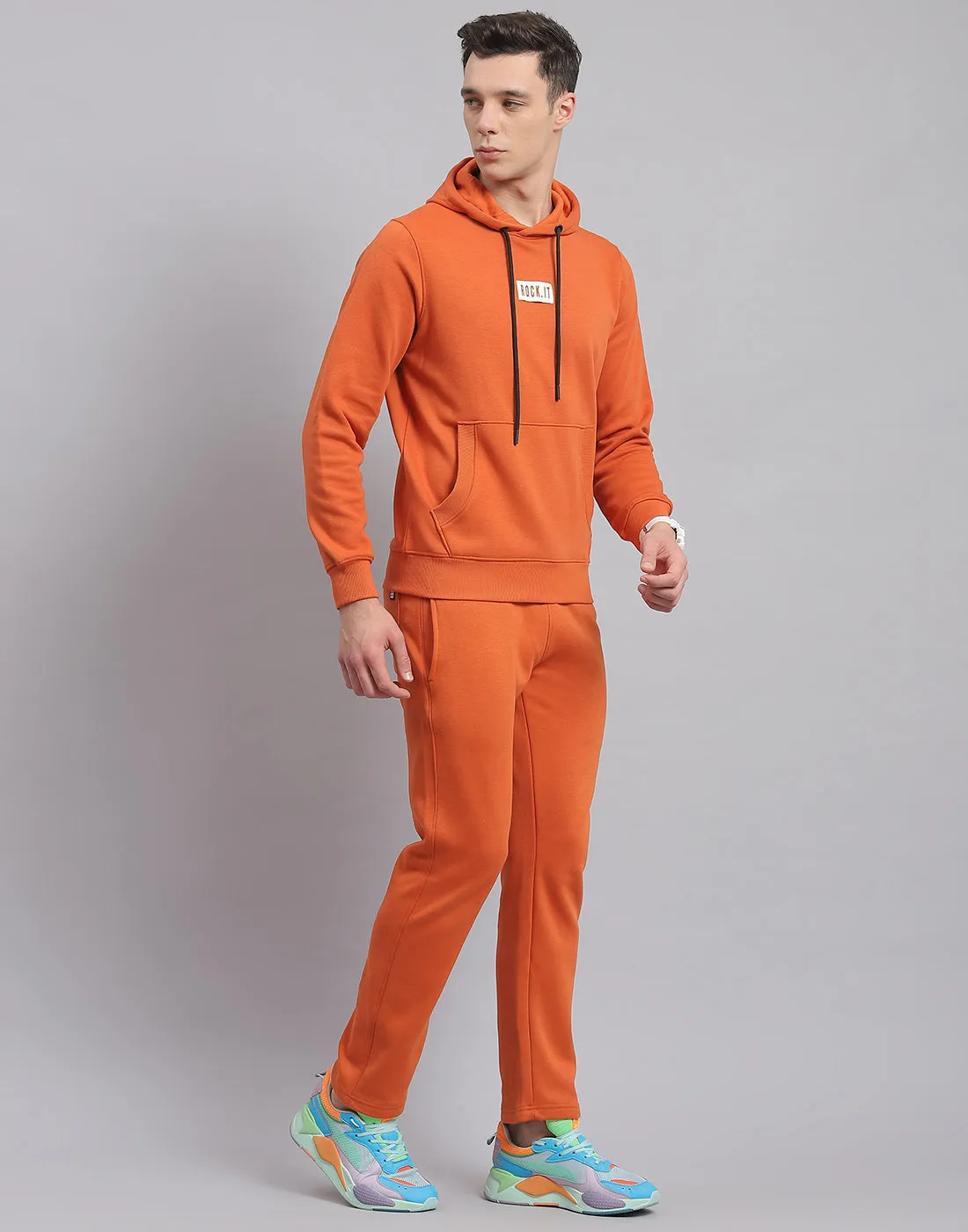 Men Rust Solid Hooded Full Sleeve Tracksuit